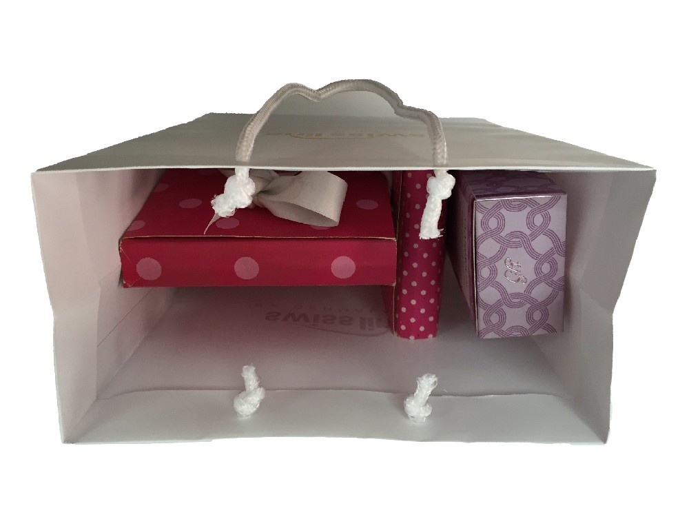 gift box in white paper bag